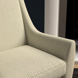 Chair upholstered in a cream herringbone wool weave upholstery fabric