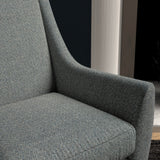 Chair upholstered in a smokey-blue herringbone wool weave upholstery fabric