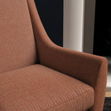 Chair upholstered in a orange herringbone wool weave upholstery fabric