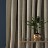 Curtain in a light neutral herringbone wool fabric