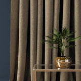 Curtain in a mid-brown herringbone wool fabric