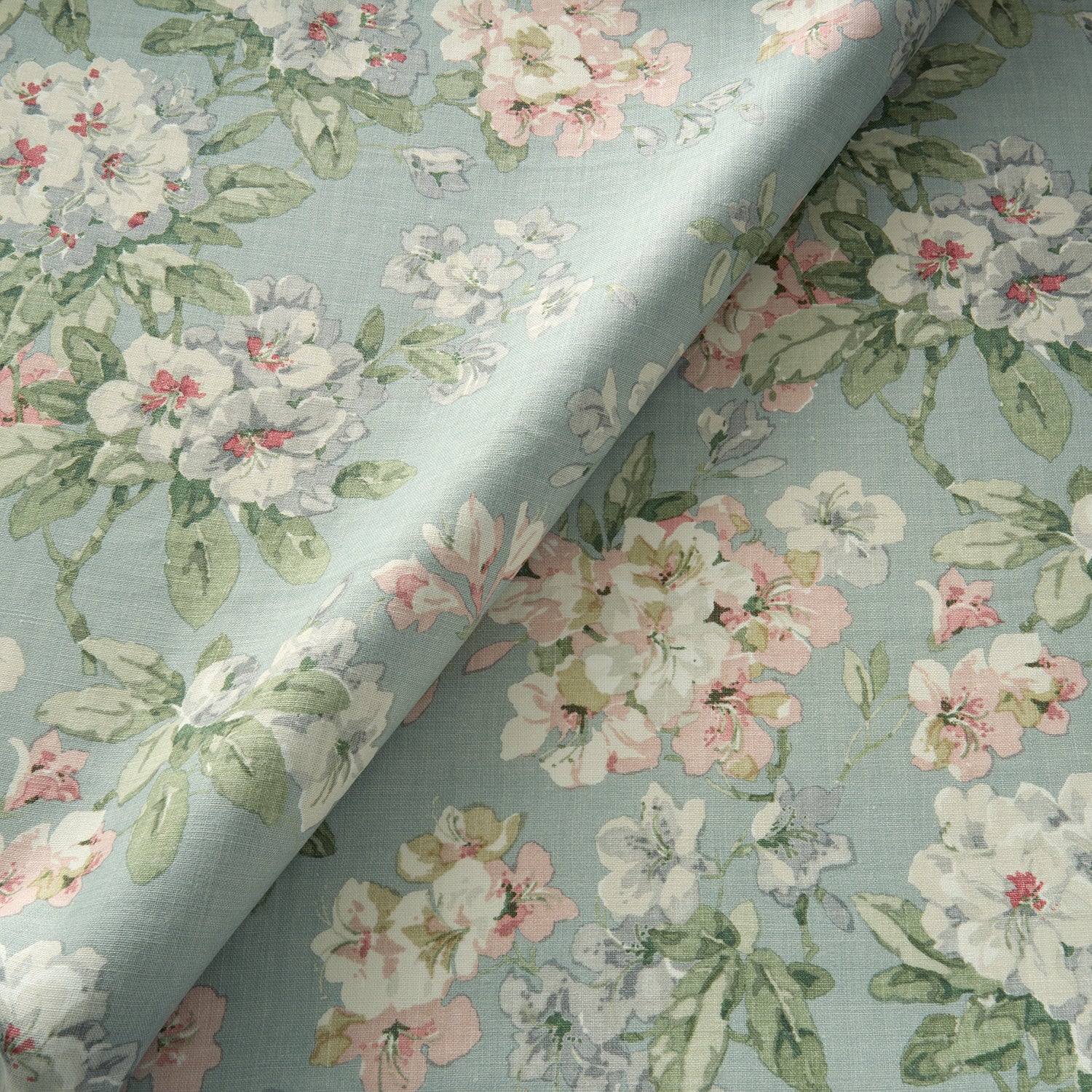 Printed linen fabric with floral pattern in blue, green and white colours for linen curtains, blinds and upholstery.
