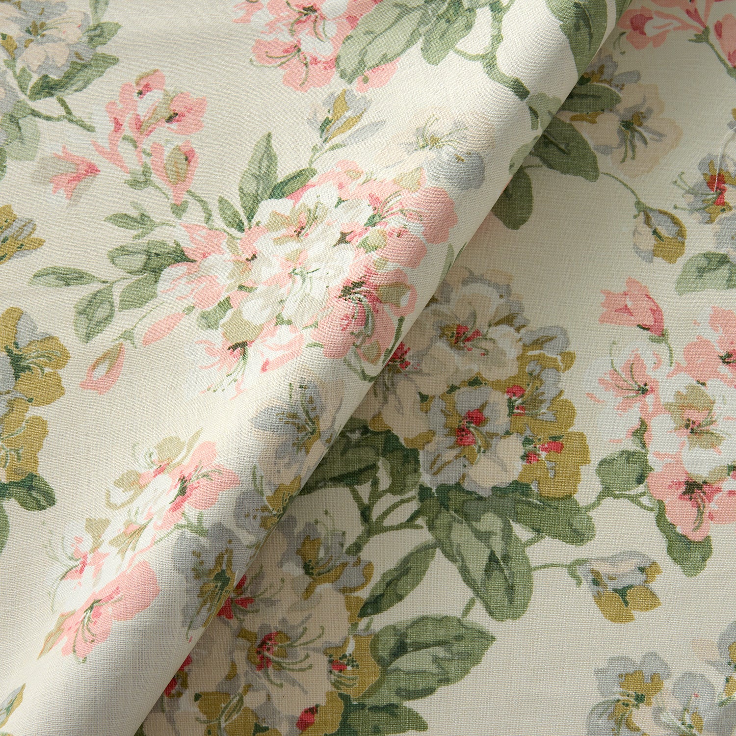 Printed linen fabric with floral pattern in white, green and pinks for linen curtains, blinds and upholstery.