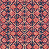 Printed velvet fabric with an oriental geometric design in pink and purple colours, for upholstery and curtain use