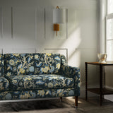Sofa is a printed linen fabric with life of tree pattern in yellow, blue and black colours.