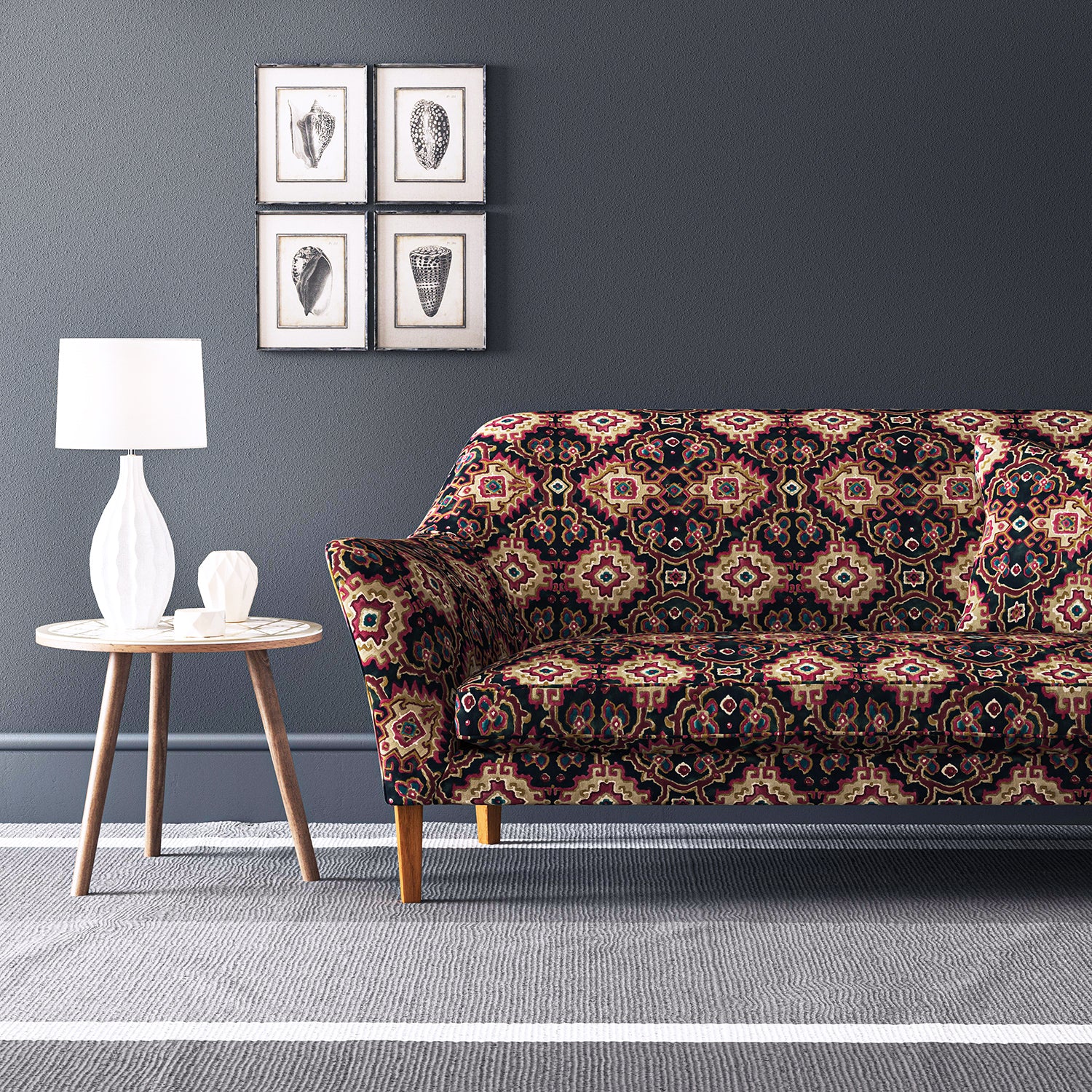 Velvet sofa upholstered in a printed velvet fabric with an oriental geometric design in multicolours