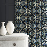 Velvet curtain in a printed velvet fabric with an oriental geometric design in blue colours