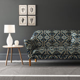 Velvet sofa upholstered in a printed velvet fabric with an oriental geometric design in blue colours