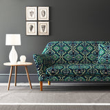 Velvet sofa upholstered in a printed velvet fabric with an oriental geometric design in blue and green colours