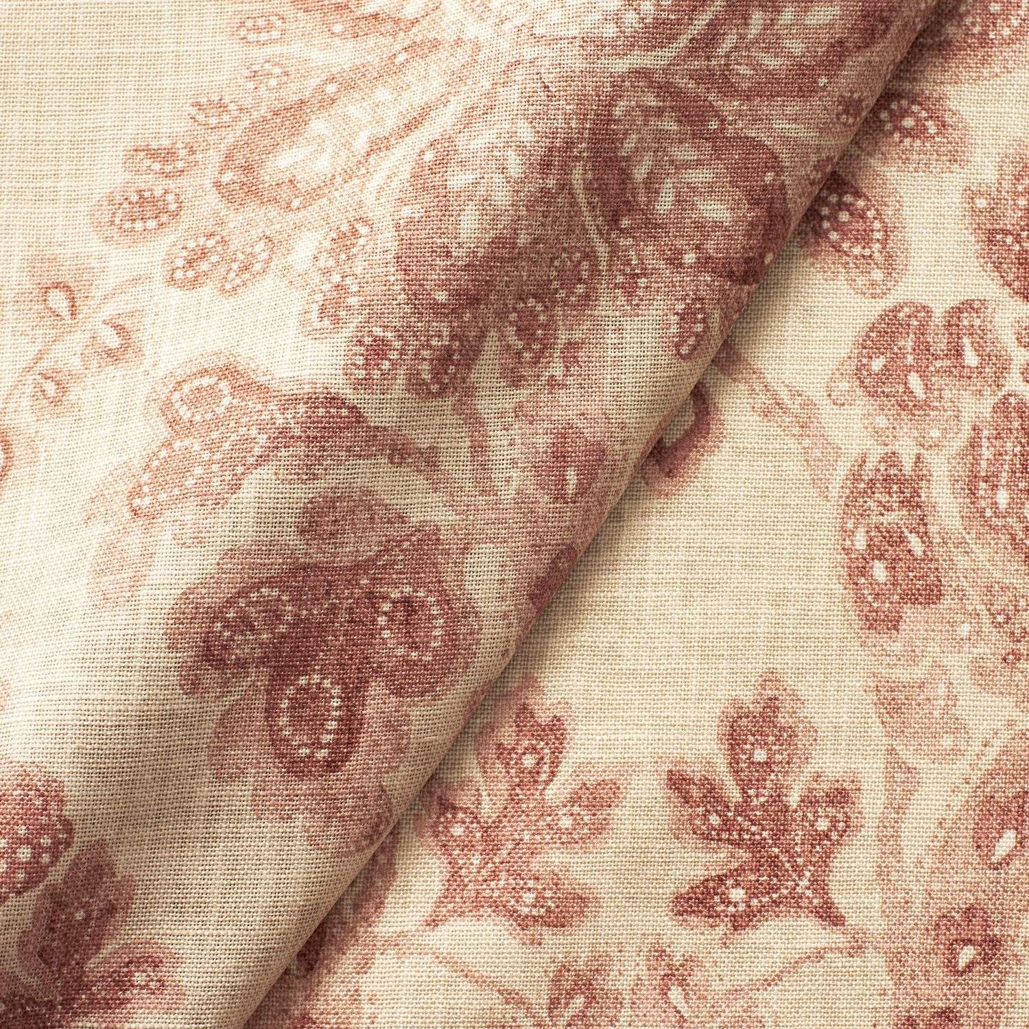 Fabric swatch of a light red floral damask fabric for curtains and upholstery