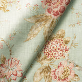 Fabric swatch of a light blue vintage inspired floral design fabric for curtains and upholstery