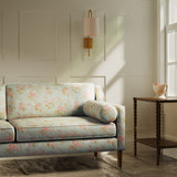 Sofa upholstered in a luxury light blue vintage inspired floral fabric