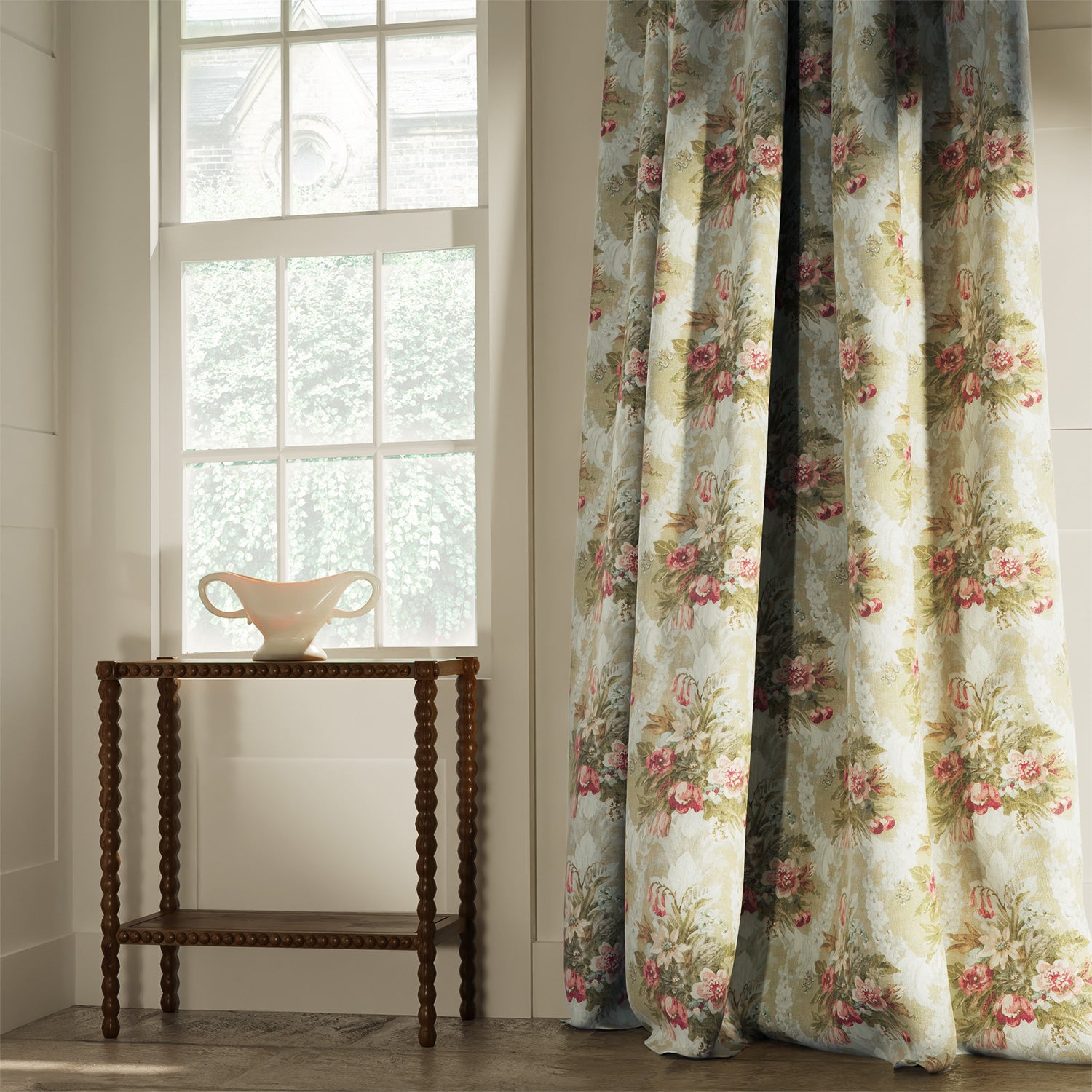 Curtains in a large floral design fabric with light green and pink colours, printed in the UK