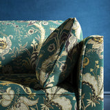 Sofa with a blue fabric with stylised floral design