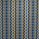 Fabric swatch of a blue and neutral fabric for curtains and upholstery with geometric Navajo inspired design