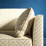 Sofa upholstered in a neutral herringbone upholstery fabric
