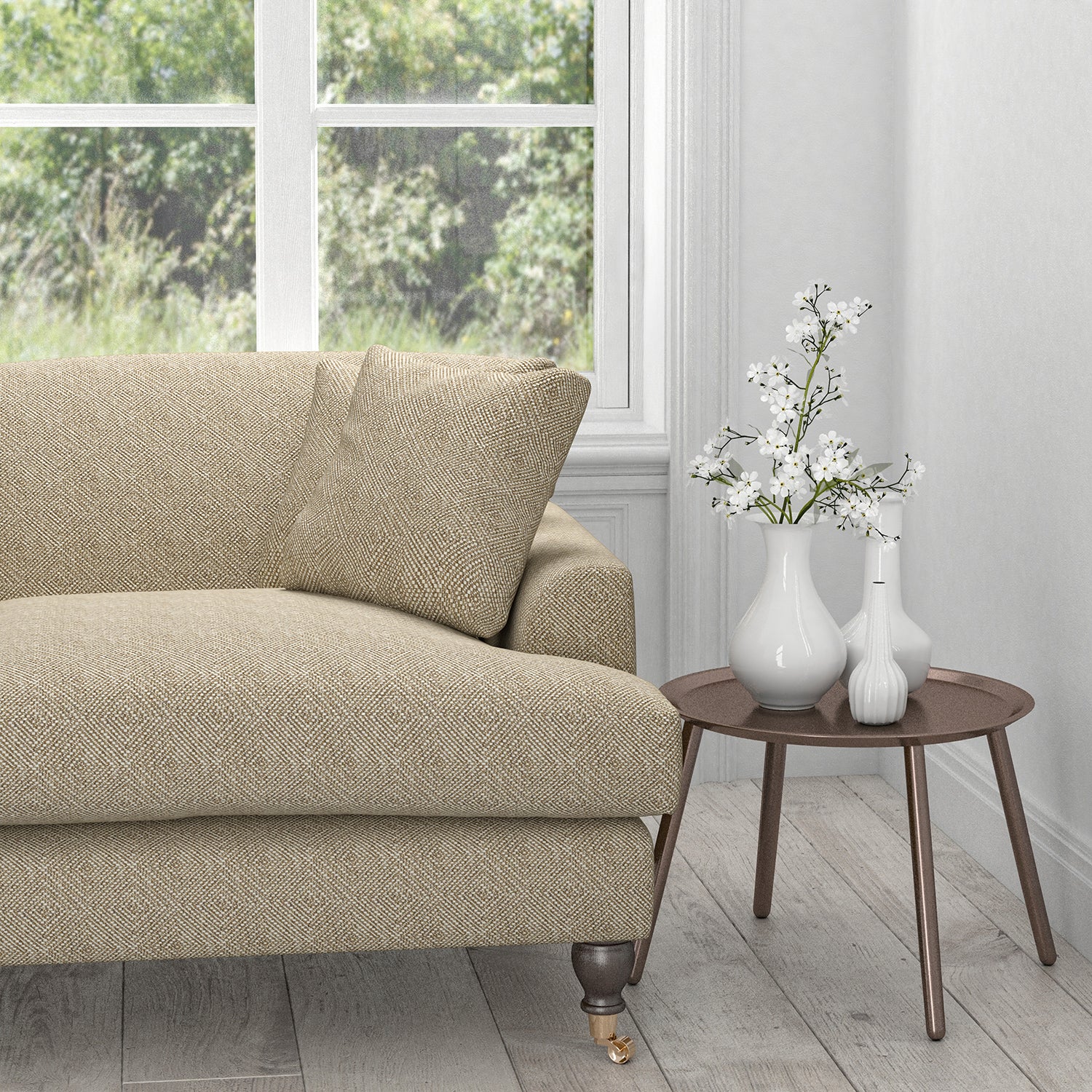 Sofa in a neutral fabric with a white geometric woven design