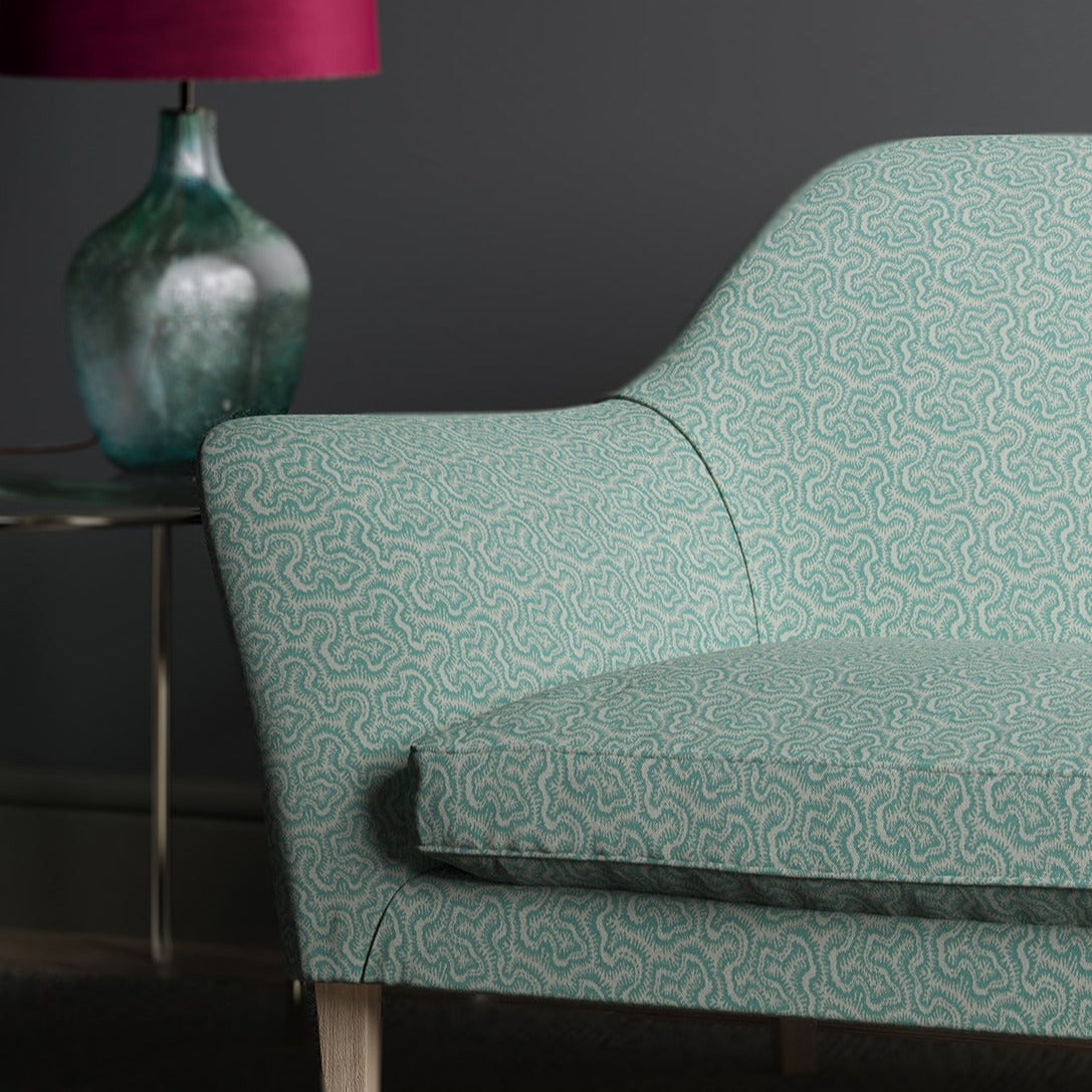 Sofa in design name Polka, colourway Sky from Tango Weaves.