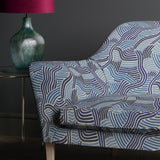 Sofa upholstered in a blue wavy printed linen fabric