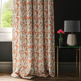 Orange curtain with a tropical leaf print fabric
