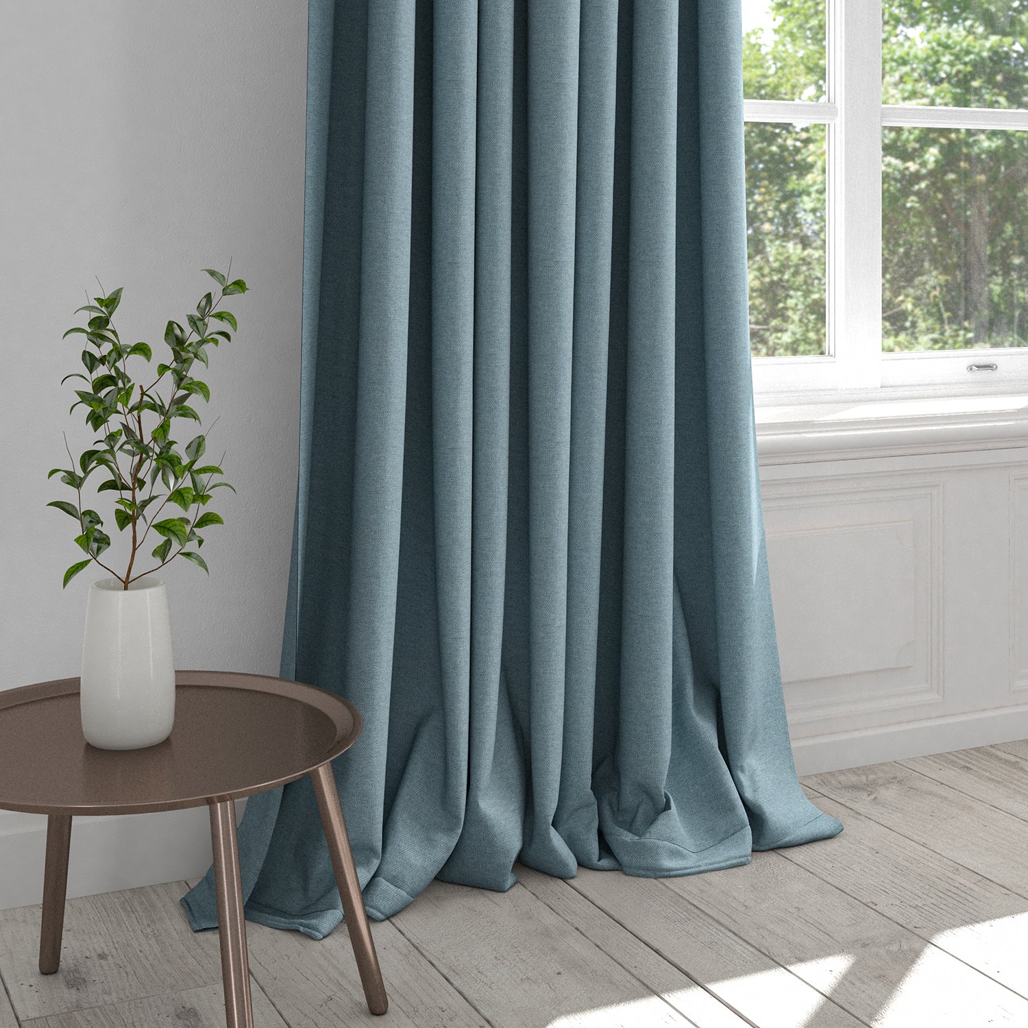 Curtain in a plain powder blue cotton fabric