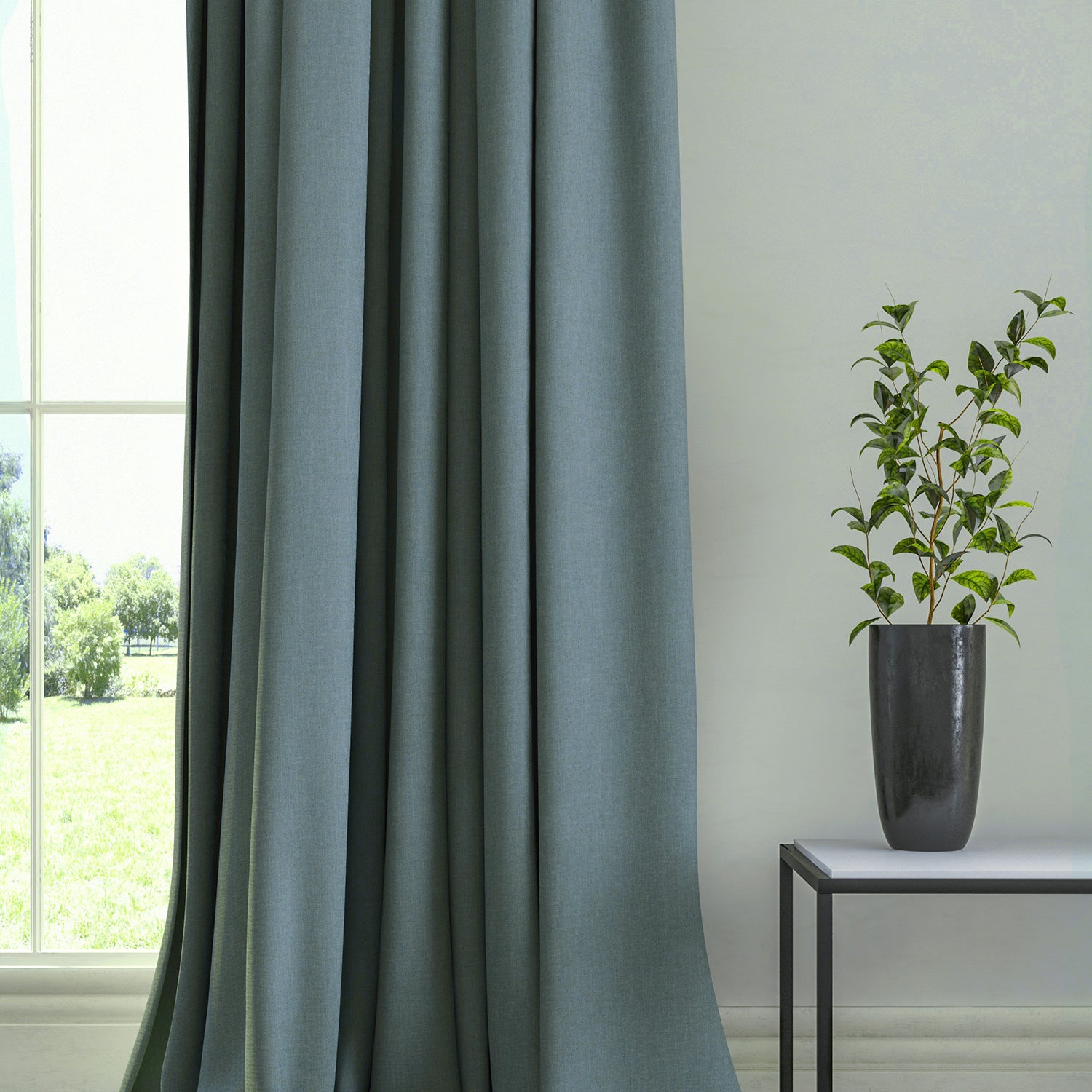 Curtain in a plain fabric, colour Bluestone.