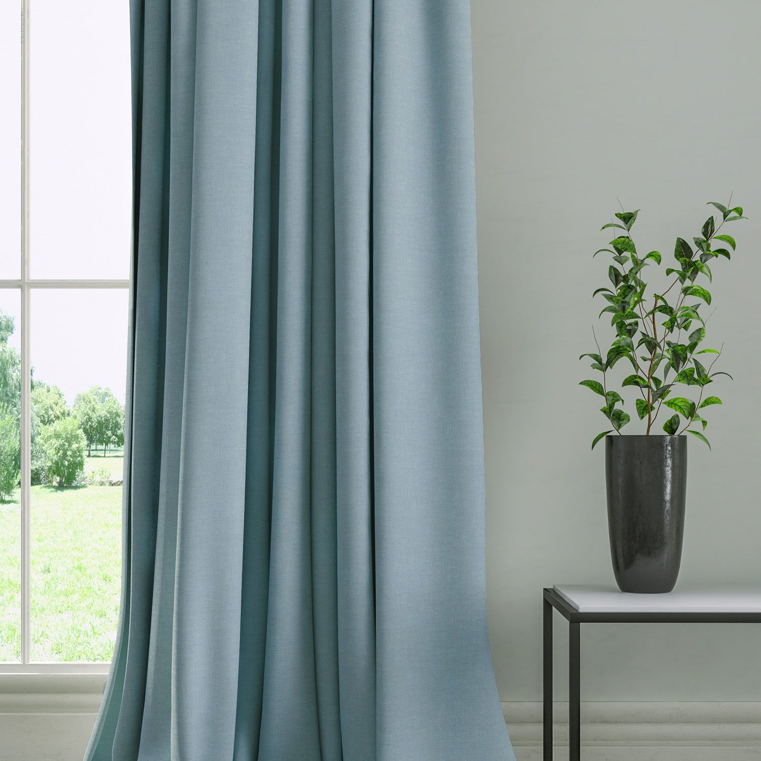 Curtain in a plain fabric, colour Periwinkle.