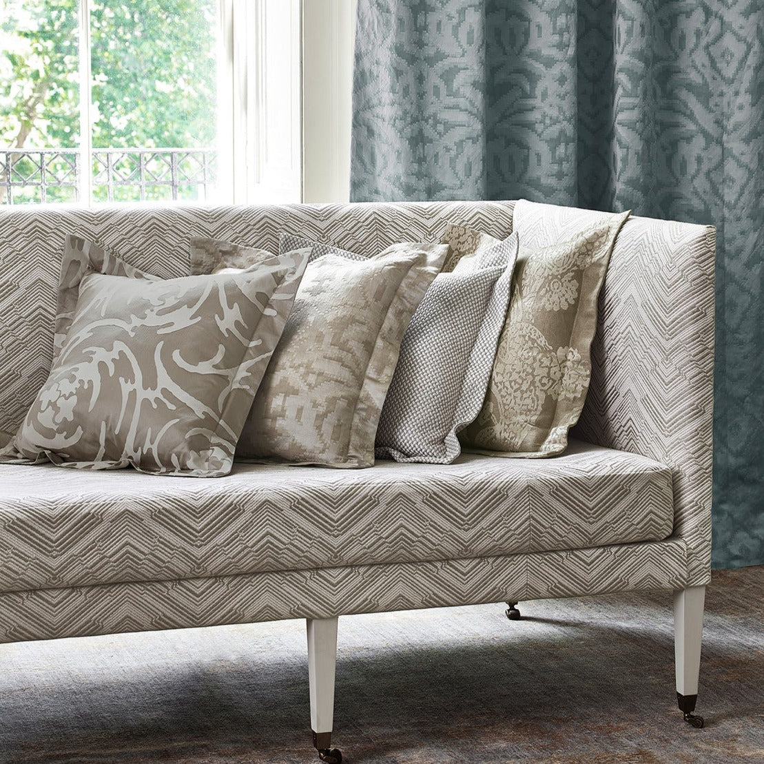 Curtain in luxury grey-blue fabric with jacquard design