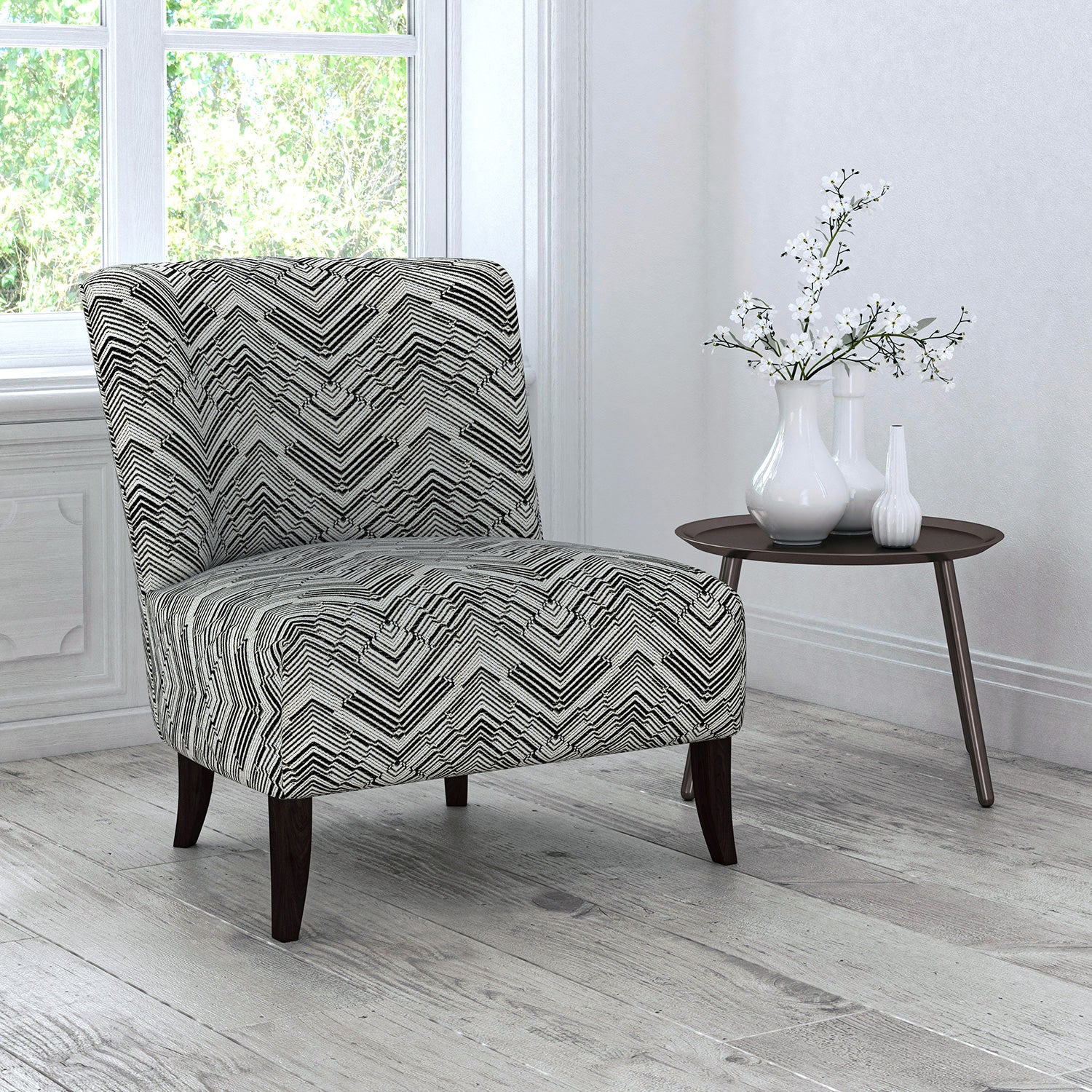 Chair upholstered in a stain resistant grey herringbone weave upholstery fabric