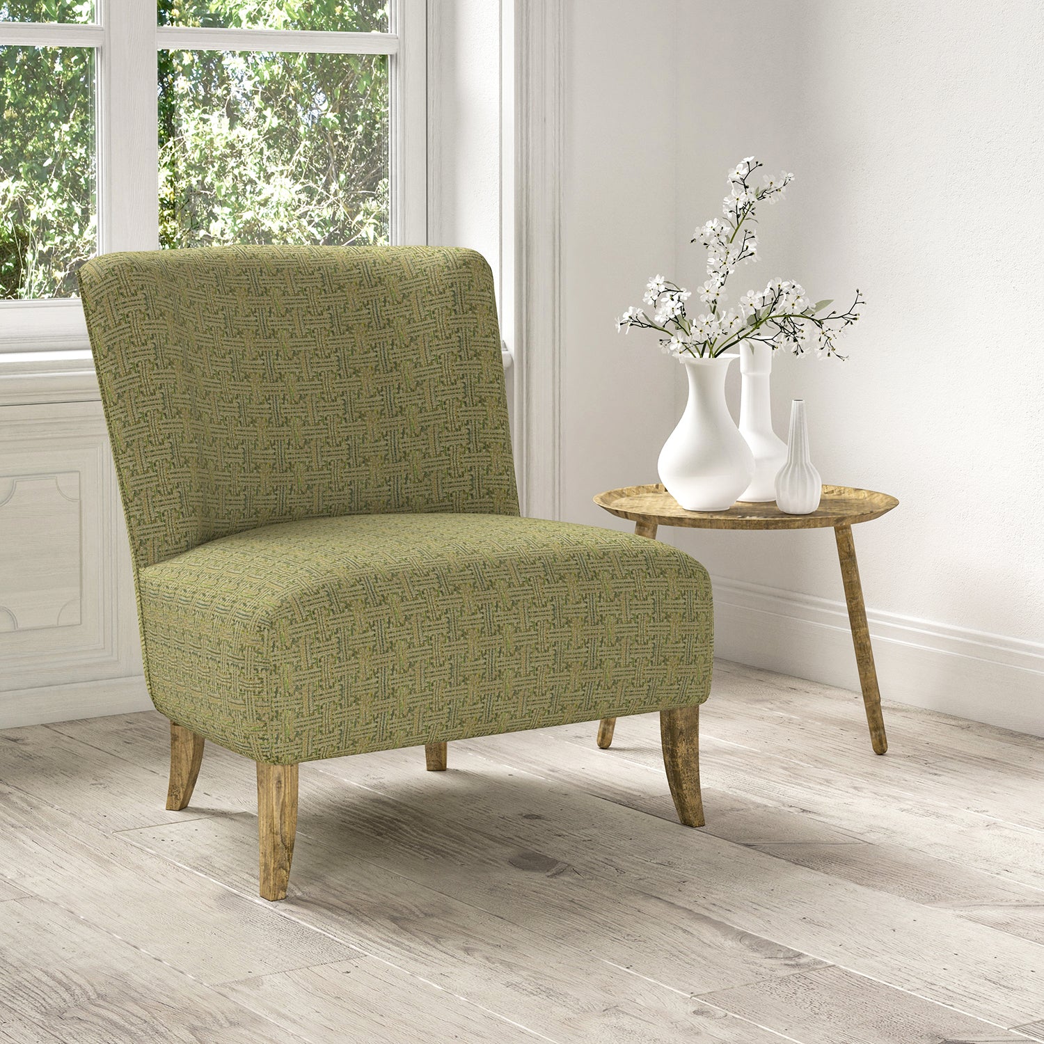 Chair upholstered in a stain resistant green fabric with geometric check design