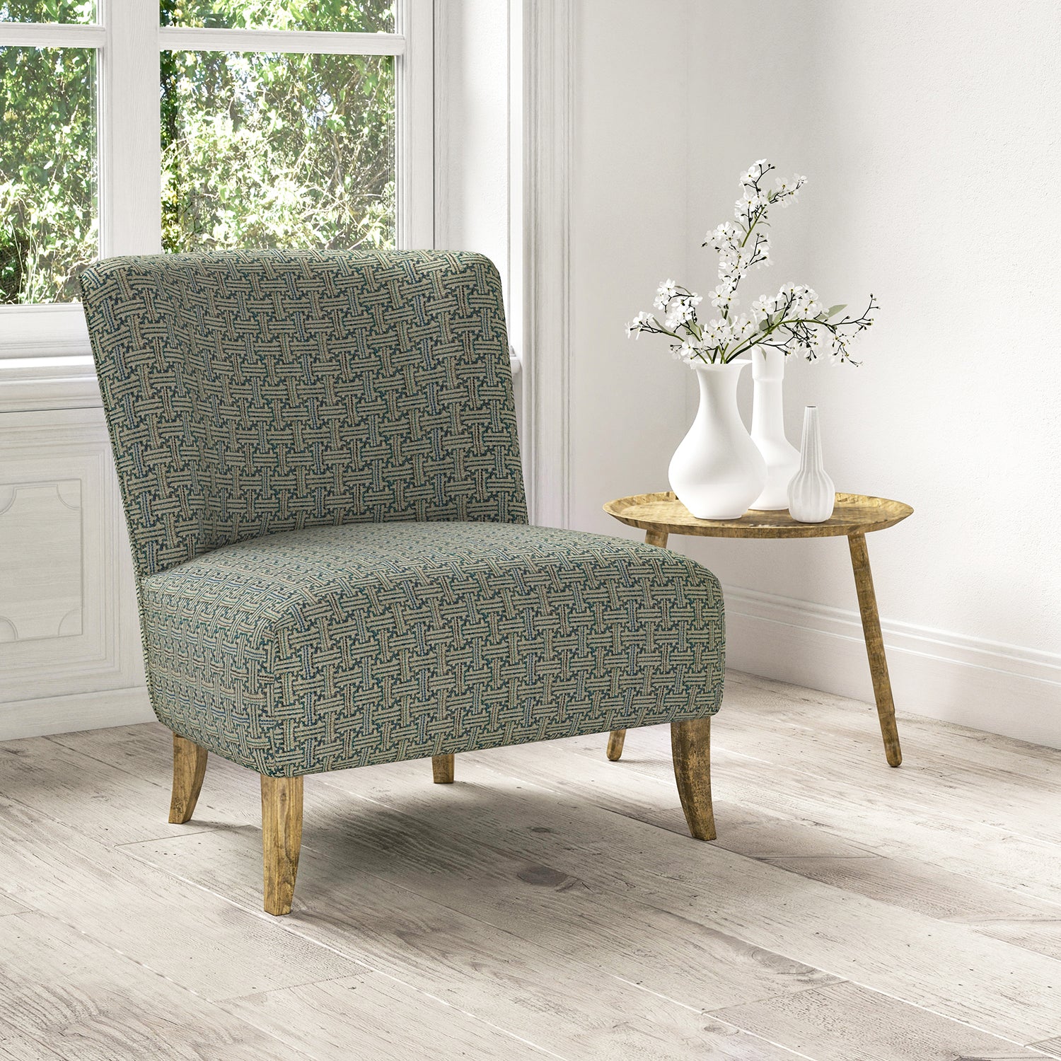 Chair upholstered in a stain resistant blue fabric with geometric check design