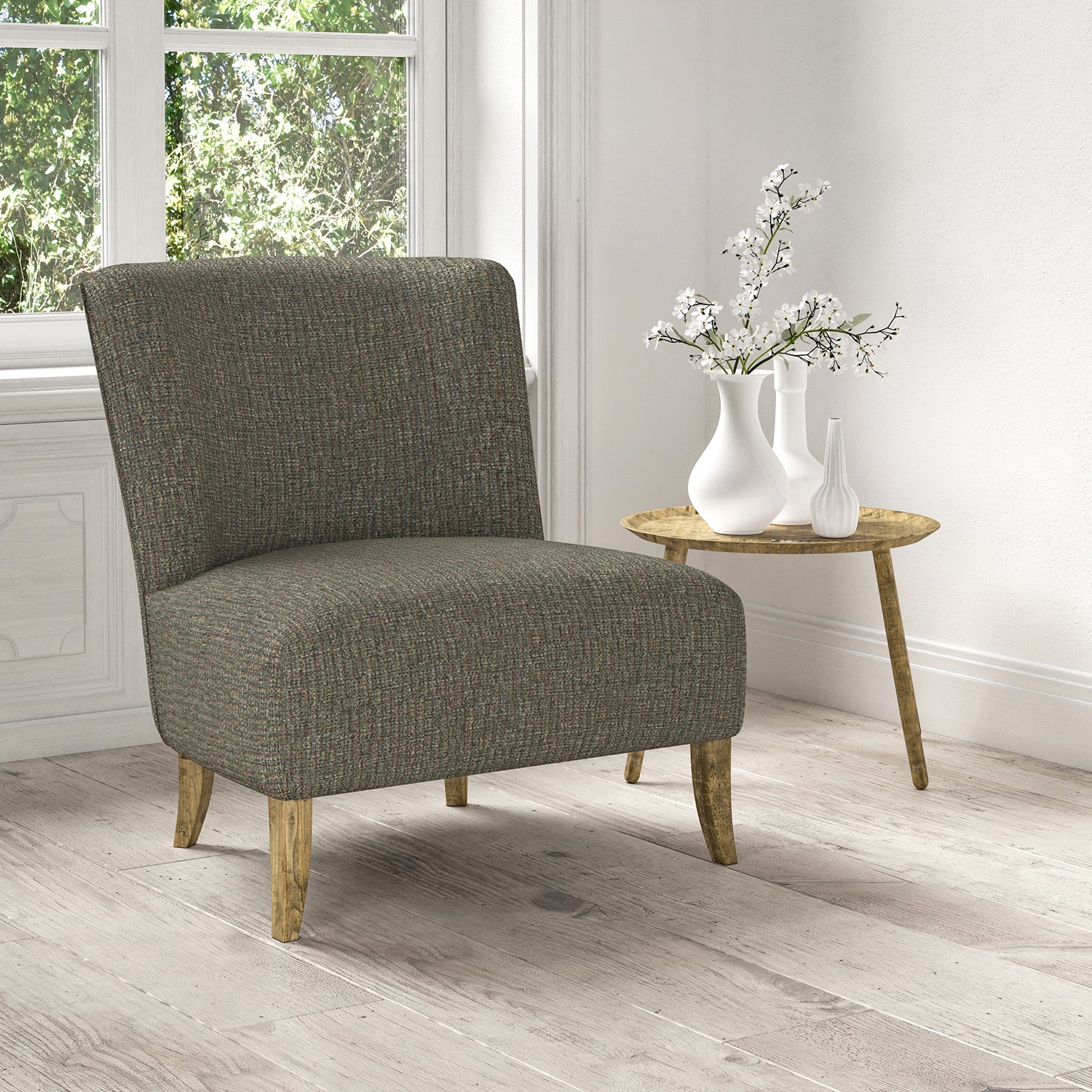 Chair upholstered in a stain resistant blue fabric with a tweed design