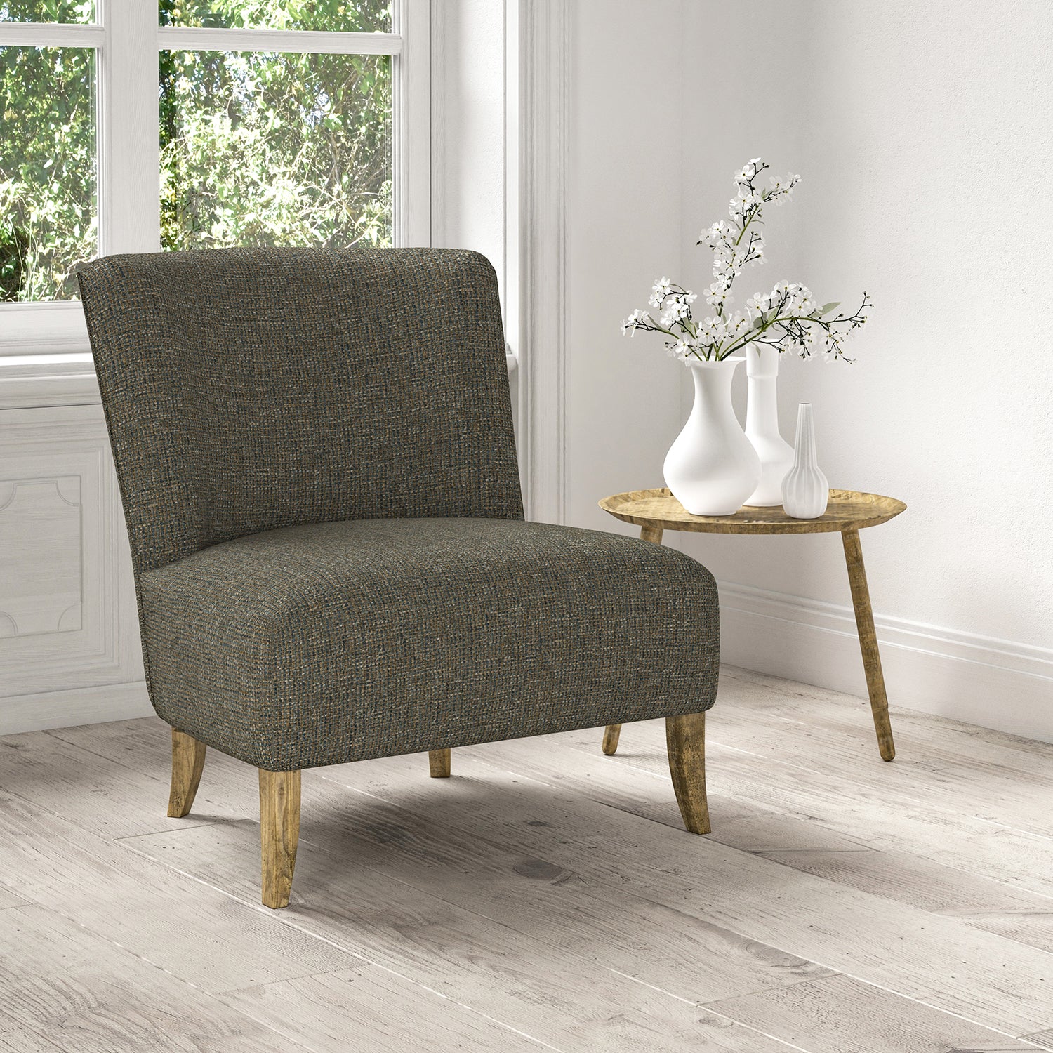 Chair upholstered in a stain resistant blue fabric with a tweed design