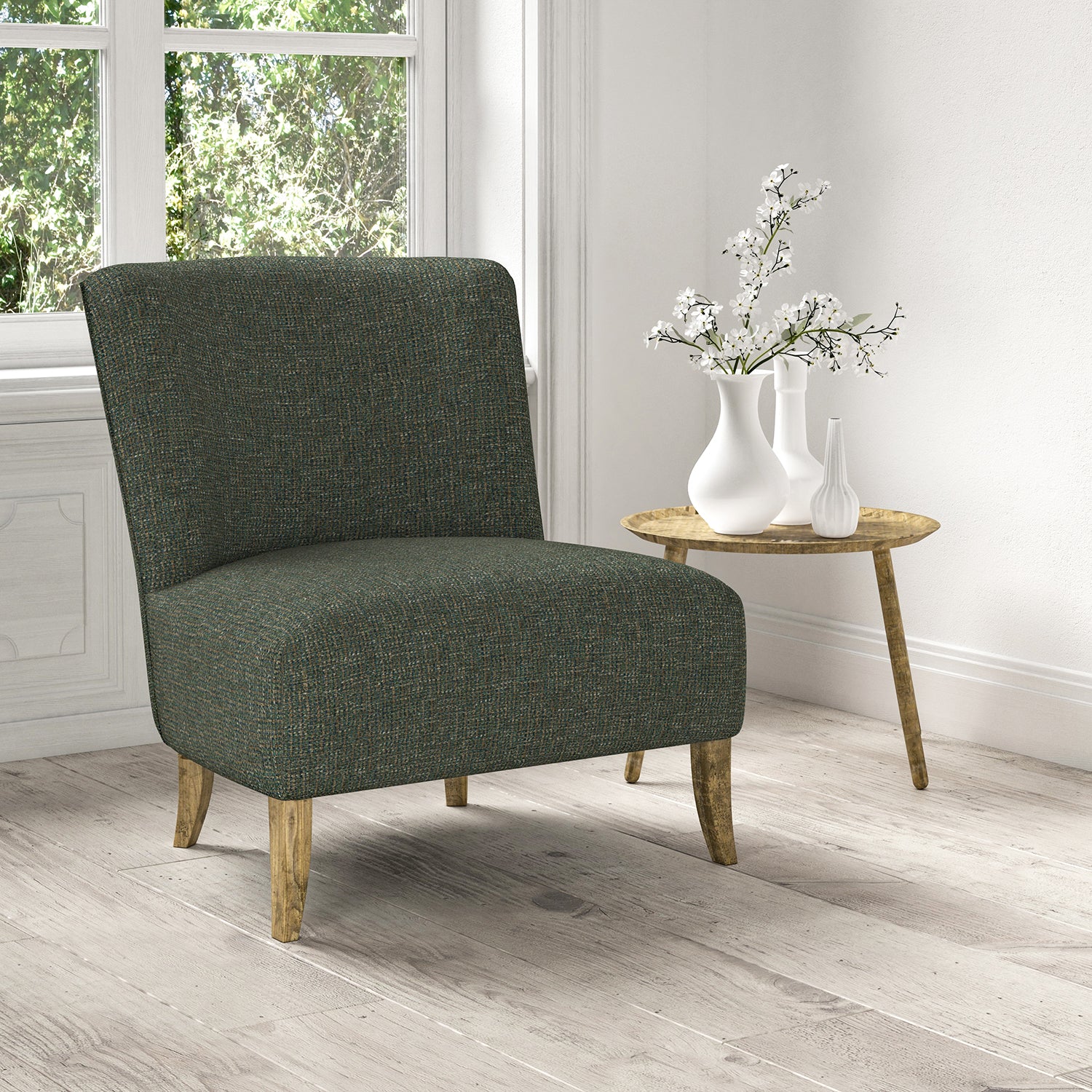 Chair upholstered in a stain resistant blue fabric with a tweed design