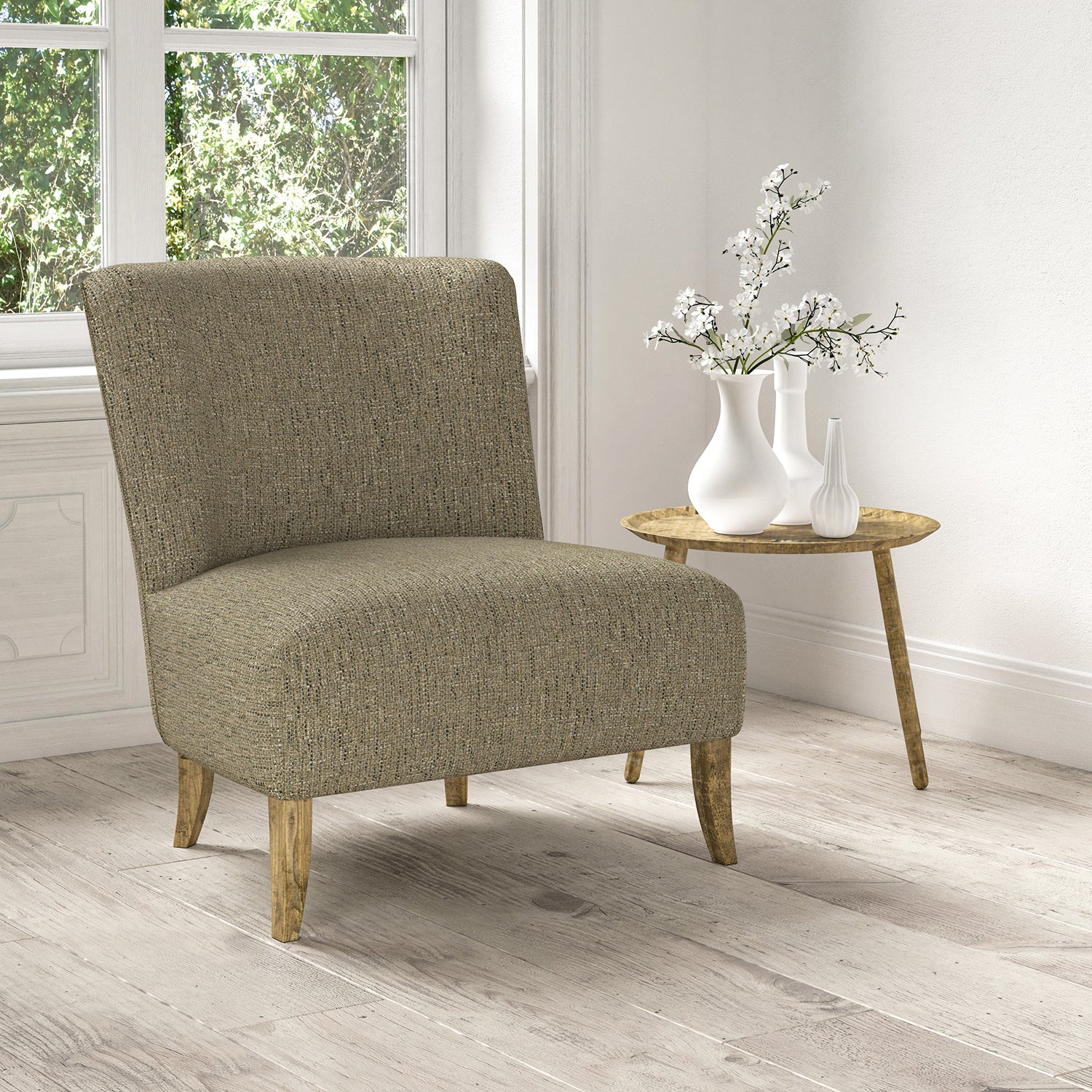 Chair upholstered in a stain resistant grey fabric with a tweed design