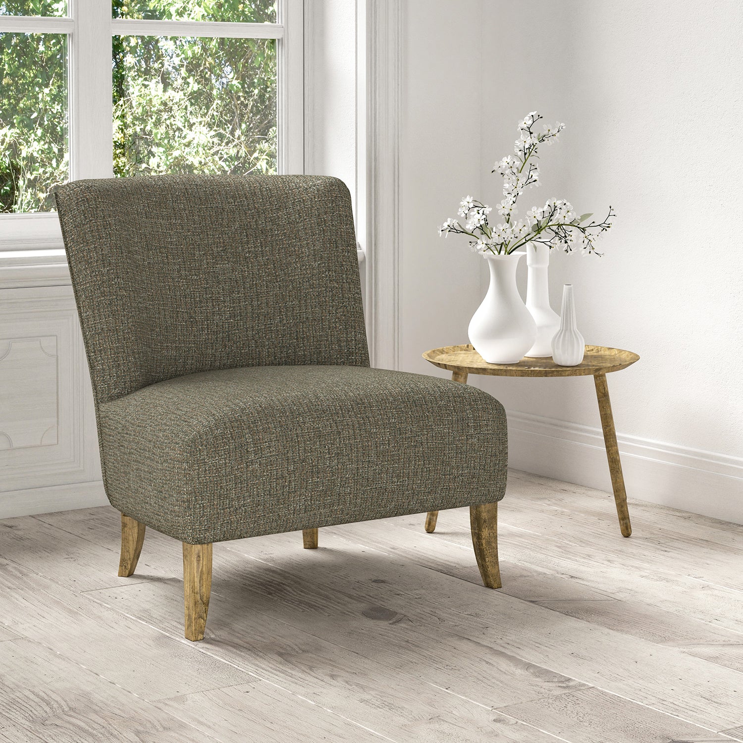 Chair upholstered in a stain resistant grey fabric with a tweed design