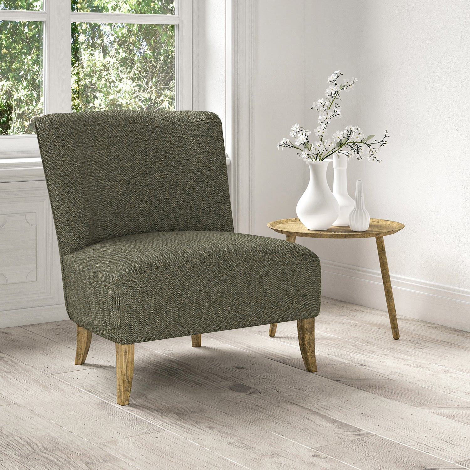 Chair upholstered in a stain resistant grey fabric with a tweed design