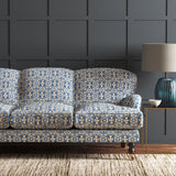 Velvet sofa in a blue velvet fabric with colour block design and stain resistant finish