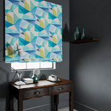 Velvet blind in a blue velvet fabric with a modern, geometric design