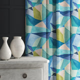 Velvet curtain in a blue velvet fabric with a modern, geometric design