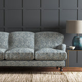 Velvet sofa in a grey velvet sofa with stain resistant finish and abstract design