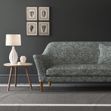 Velvet sofa in a grey velvet sofa with stain resistant finish and abstract design