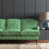 Velvet sofa in a green velvet sofa with stain resistant finish and abstract design