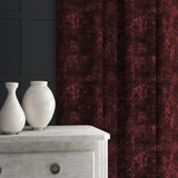 Velvet curtain in a dark red velvet fabric with a contemporary carpet design