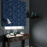 Velvet blind in a blue velvet fabric with a contemporary carpet design