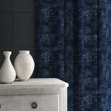 Velvet curtain in a blue velvet fabric with a contemporary carpet design