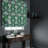Velvet blind in a blue and green velvet fabric with contemporary abstract design