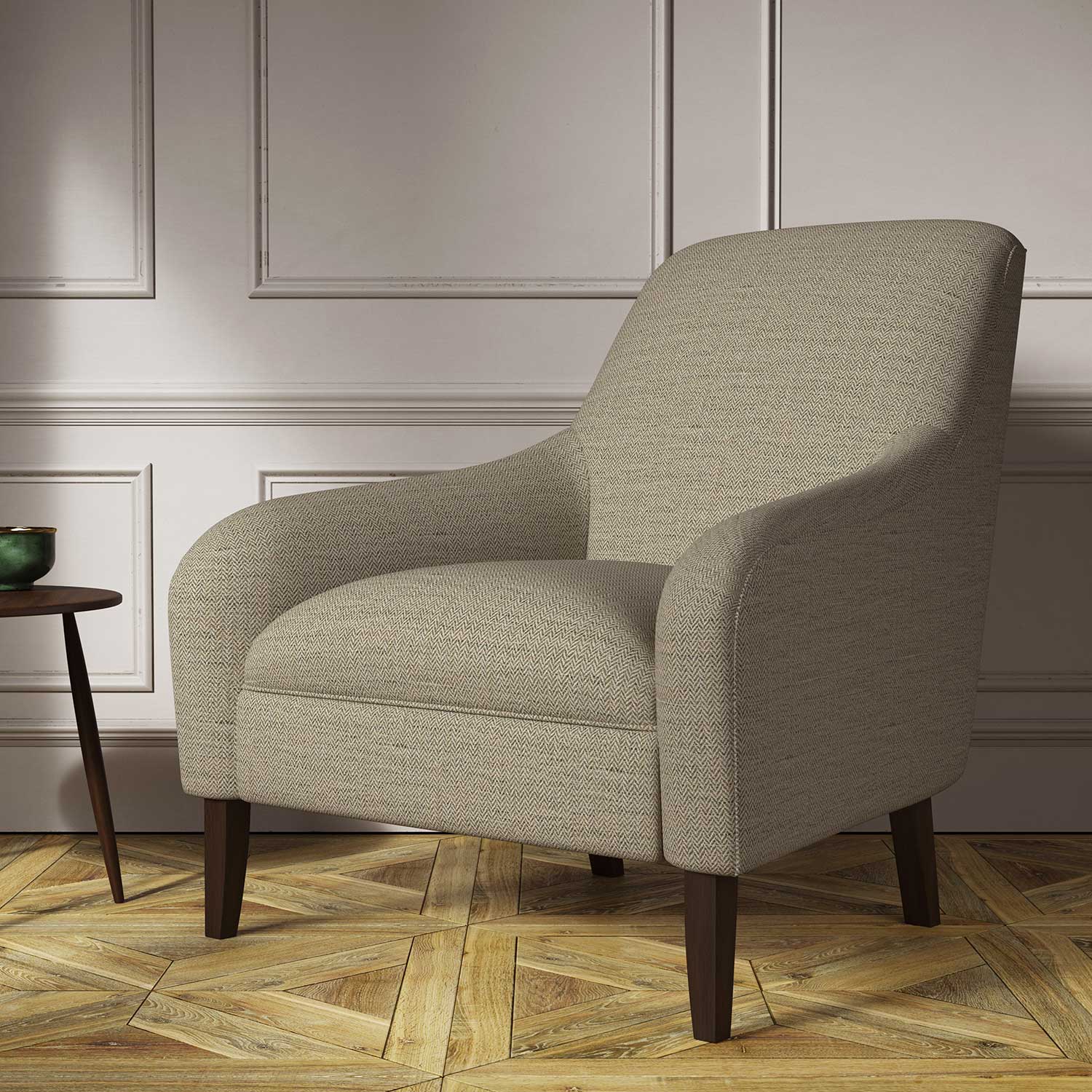 Chair covered in a woven fabric in a herringbone design in Mushroom