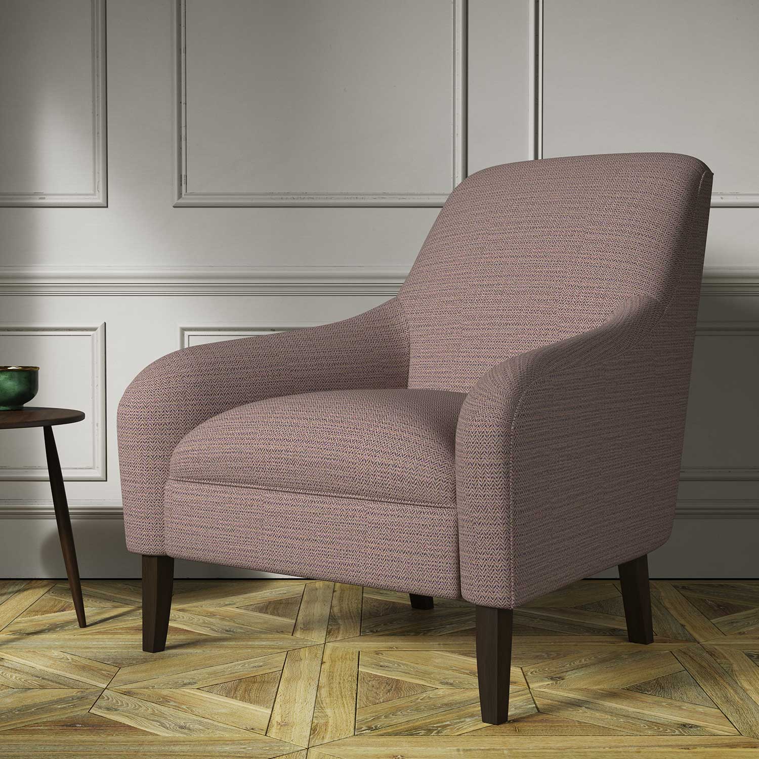 Chair covered in a woven fabric in a herringbone design in Haze