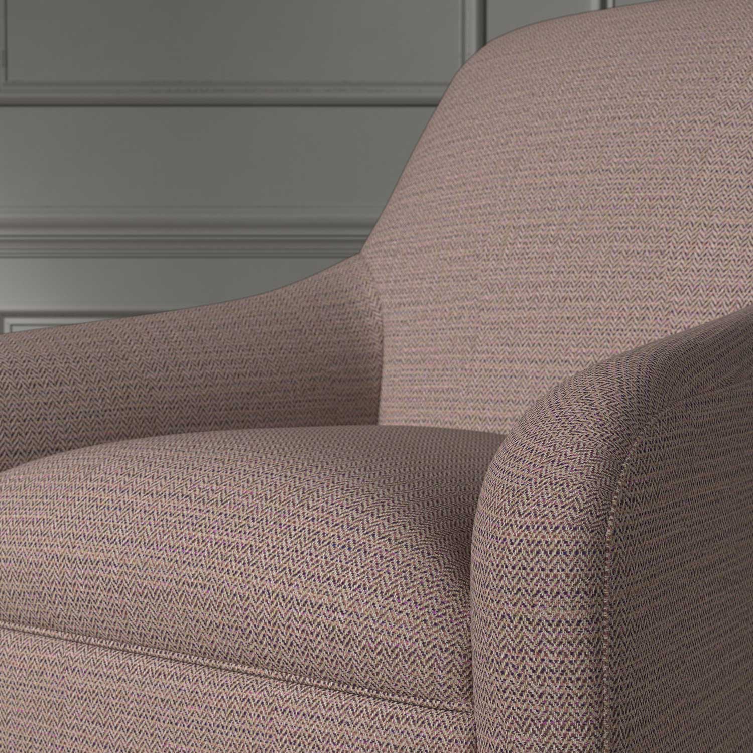 Close up of a chair covered in a woven fabric in a herringbone design in Haze
